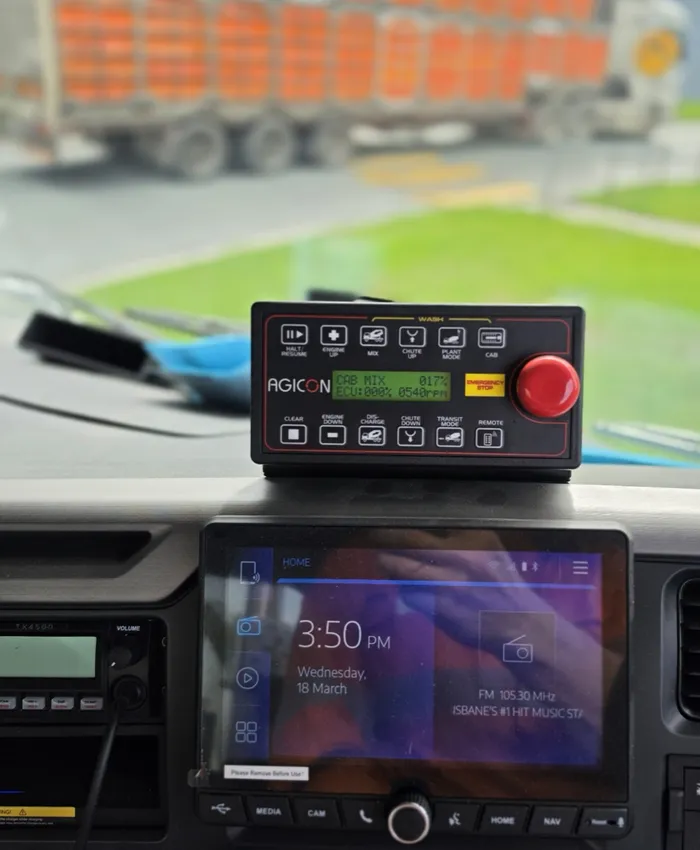AGICON in-cab mixer control unit mounted beside the driver