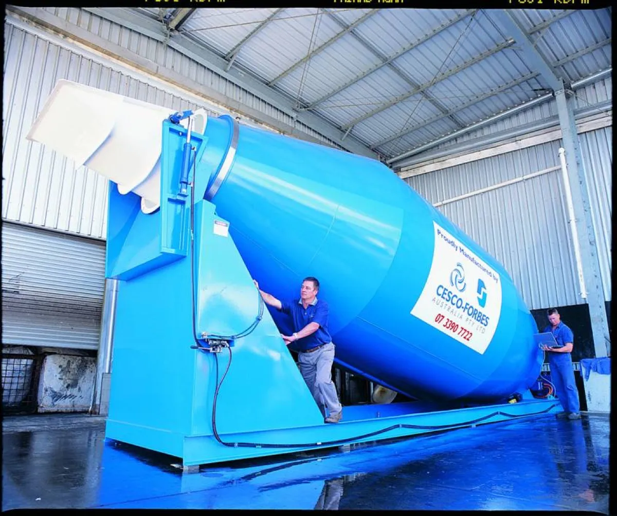A barrel under construction with workers in the Cesco factory