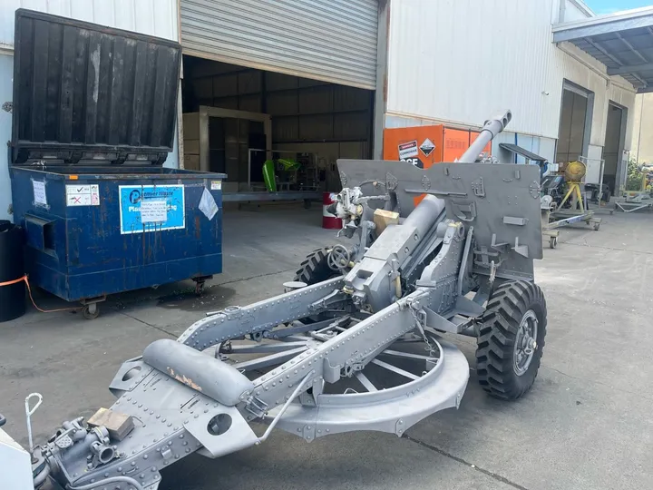 The field gun blasted back and primed in grey