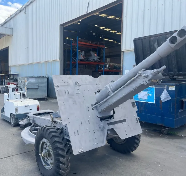 The field gun on its carriage after blasting and priming