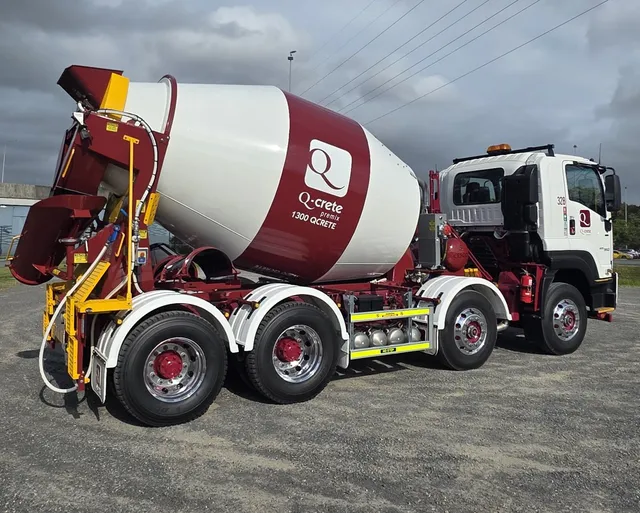 Q-Crete Cesco mixer truck in maroon and white