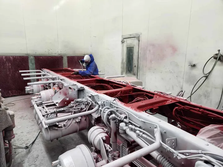 A painted chassis with refurbished air and fuel components in the paint booth