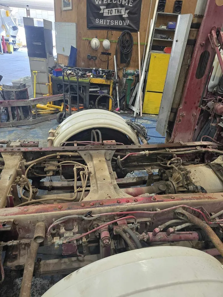 Chassis and running gear exposed during a refurbishment strip-down