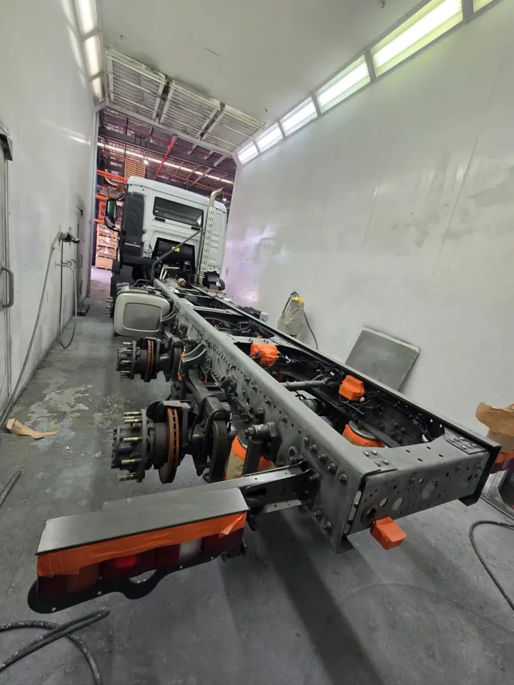 A refinished chassis rail in the paint booth ready for reassembly