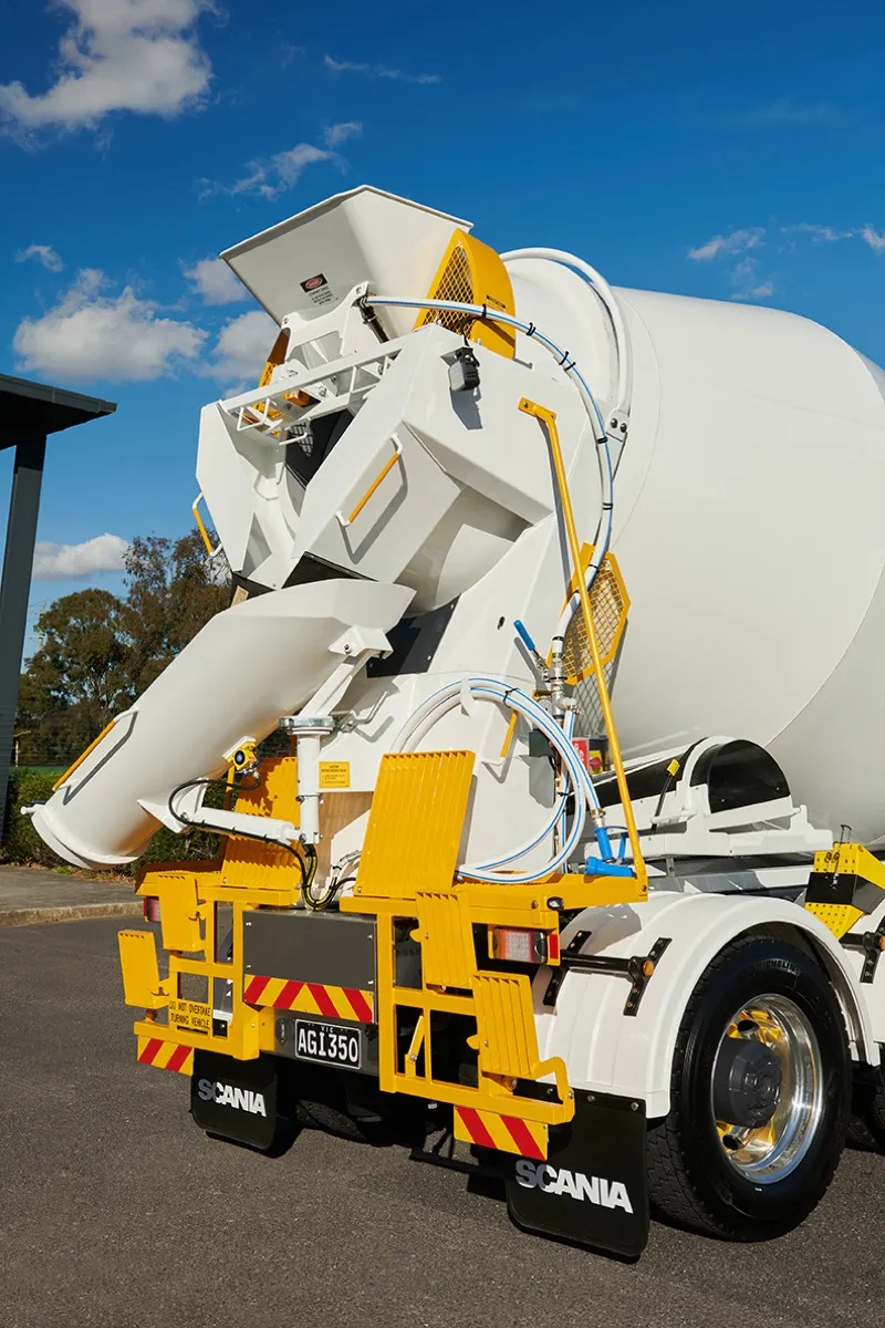 Rear pedestal, chutes and controls of a Cesco mixer on a Scania chassis
