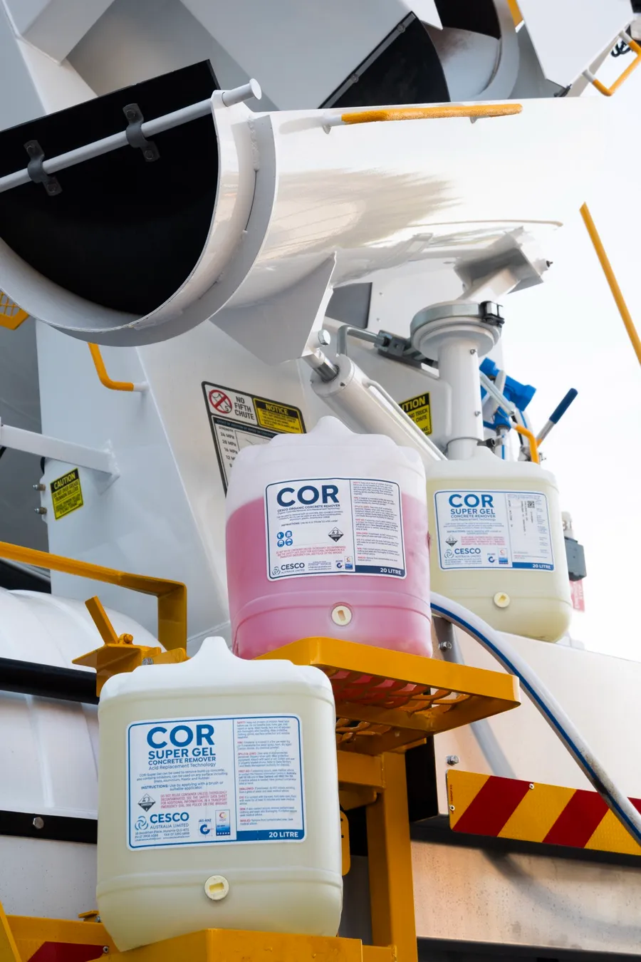 COR Super Gel and COR containers mounted on the rear of a white Cesco mixer